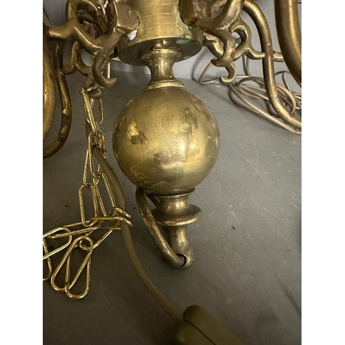 223 - A brass five arm ceiling light with green satin shade