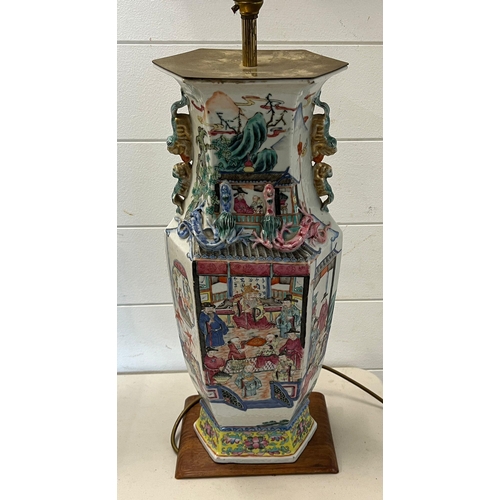 231 - A Chinese figural table lamp with foo dog style handles to side (H56cm)