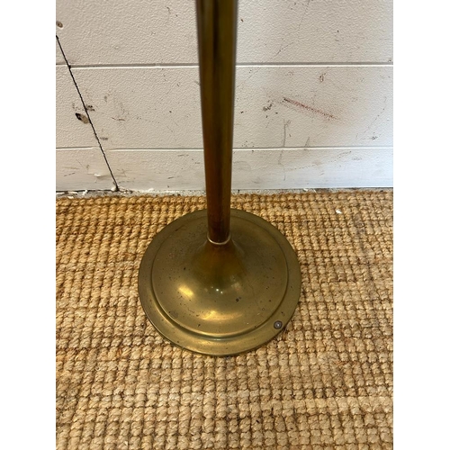 242 - A brass angle poise floor standing lamp (H156cm)