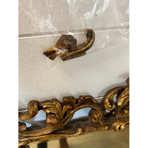 268 - A French rococo giltwood wall mirror 69cm x 92cm