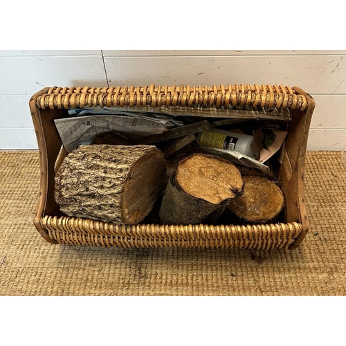 27 - A wicker three quarto barrel shaped log basket (W64cm)