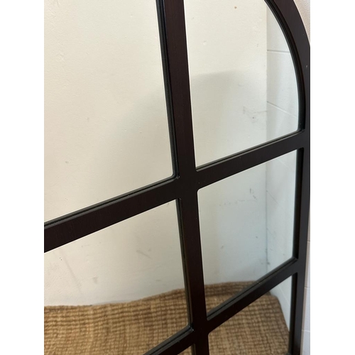 271 - A contemporary arched hall mirror comprising of six mirrored panels in a black frame 92cm x 60cm