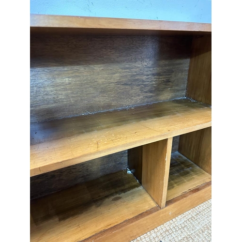 28 - A Mid Century two shelf multi compartment bookcase (H60cm W123cm D23cm)