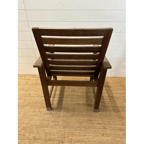 281 - A pair of slatted wooden garden chairs