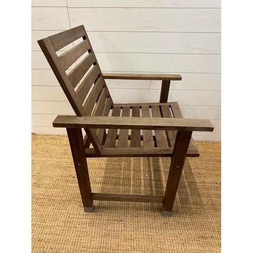 281 - A pair of slatted wooden garden chairs