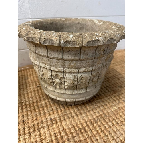 284 - Two concrete garden planters with floral banded motif (H22cm Dia28cm)