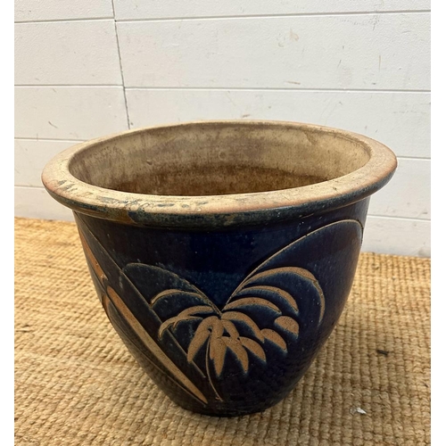 291 - A blue glazed terracotta garden pot