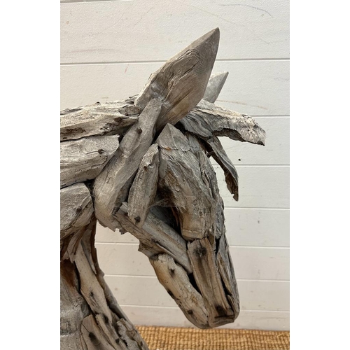 292A - A driftwood garden sculpture of a horse head (H86cm)