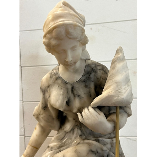 292B - A marble sculpture of a women sitting with an umbrella AF