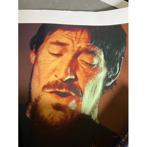 310 - A selection of Chris Rea prints ,music award and signed Chris Rea (Blue Guitars) book plus one other