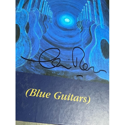 310 - A selection of Chris Rea prints ,music award and signed Chris Rea (Blue Guitars) book plus one other