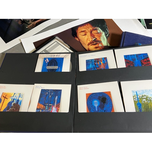 310 - A selection of Chris Rea prints ,music award and signed Chris Rea (Blue Guitars) book plus one other