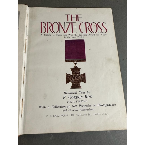 333 - A selection of military themed books to include: The Bronze Cross by F Gordon Roe, Imperial War Grav... 