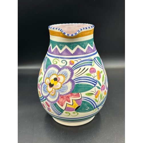 346 - A Poole pottery jug, approximately 20cm H floral pattern decorated by Clarice Heath