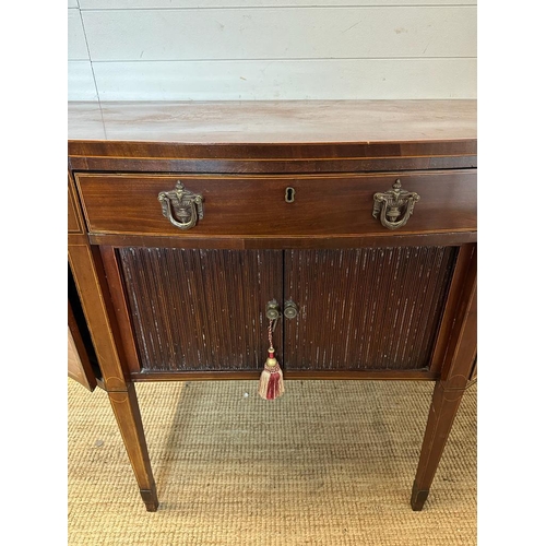 35 - A Georgian mahogany sideboard with string inlay and roll shutter cupboards (H100cm W168cm D71cm)