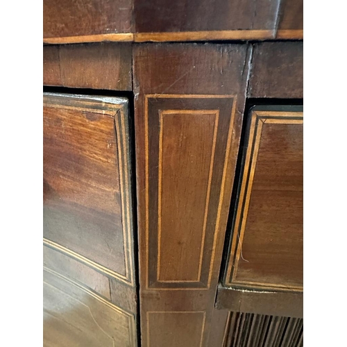 35 - A Georgian mahogany sideboard with string inlay and roll shutter cupboards (H100cm W168cm D71cm)