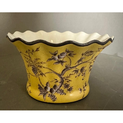 360 - A yellow ground planter with a vine and olive pattern