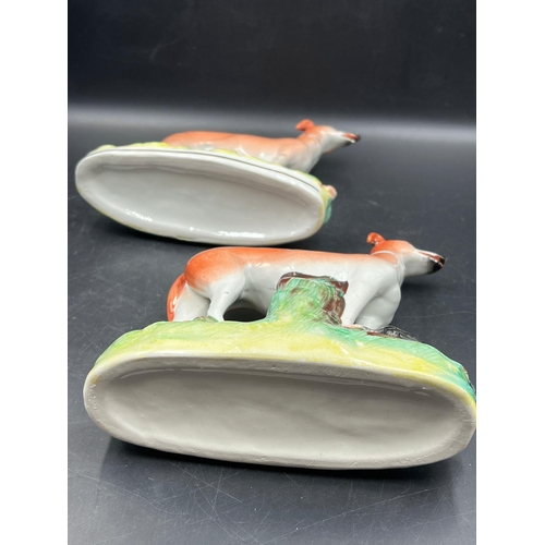 365 - A pair of 19th Century Staffordshire hunting dogs (H18cm)