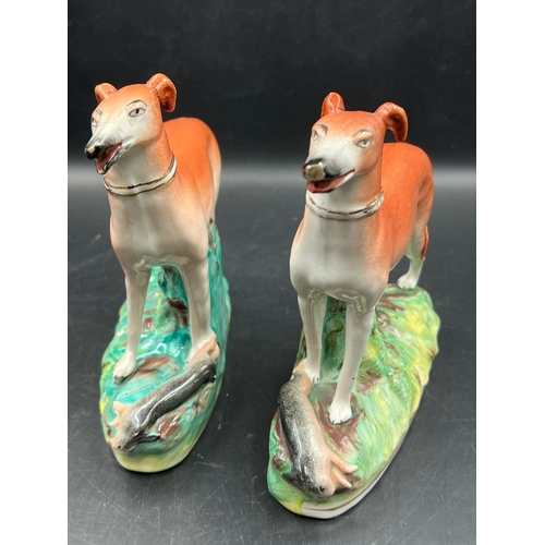 365 - A pair of 19th Century Staffordshire hunting dogs (H18cm)