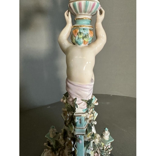 374 - A pair of figural four arm Dresden ceramic candle stick