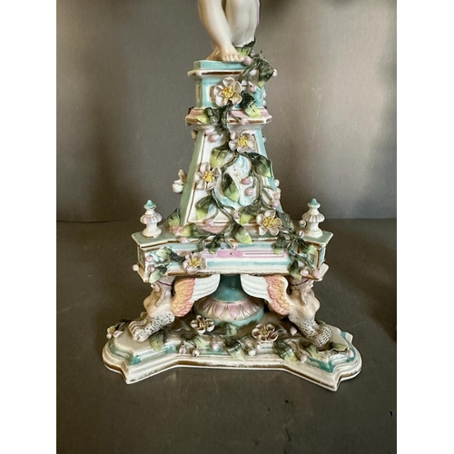 374 - A pair of figural four arm Dresden ceramic candle stick