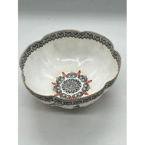 379 - A Chinese decorated porcelain bowl with scalloped edge