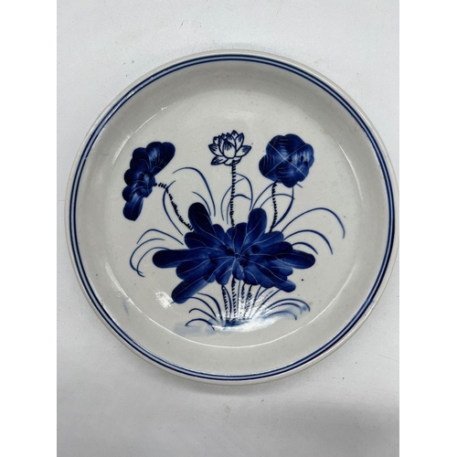 380 - A porcelain blue and white glazed plate decorated with a lotus plant