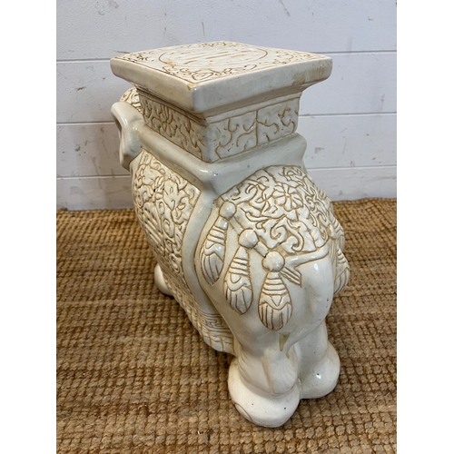 381 - A pair of white ceramic elephant themed plant stands. H 40cm