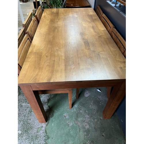 40 - A hardwood dining table with eight chairs (H80cm W183cm D90cm)