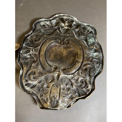 402 - A pair of brass wall sconce, cast backplate with winged cherubs and twin arm candle holders