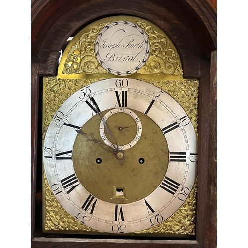 411 - A eight day long case clock, the brass arched dial signed Joseph Smith Bristol, with a silver chapte... 