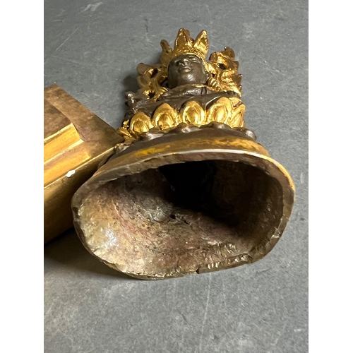 423 - Two Buddha statues on wooden gilt bases