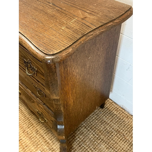 43 - A wooden side cabinet with faux drawers opening to a cupboard (H65cm W74cm D40cm)