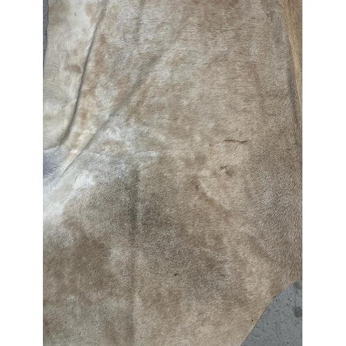 433 - A  cow hide rug or wall hanging 259 x 219