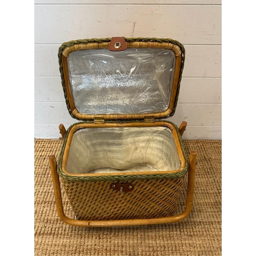 452 - A vintage upright wicker picnic basket