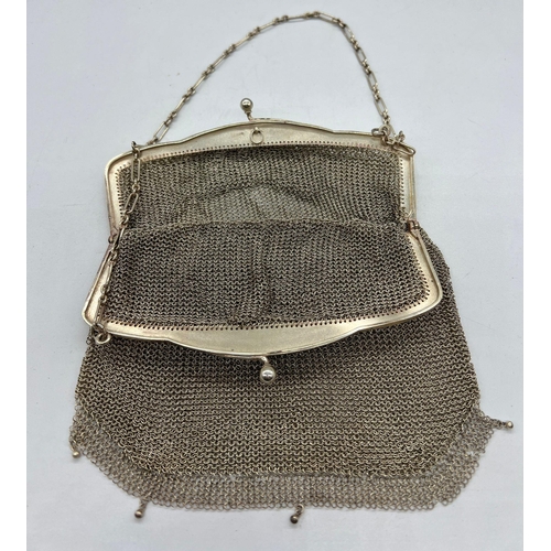 472 - A sterling silver and mesh purse (21cm x 14cm)