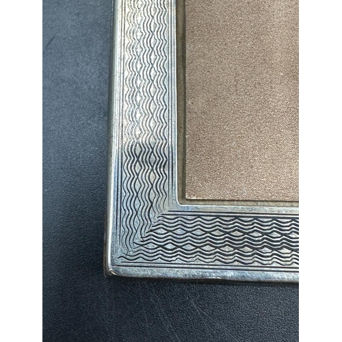 473 - Two AF silver picture frames 22cm x 17cm