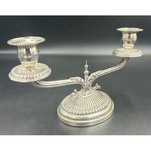 476 - A Greek silver, marked 800, two light candle stick