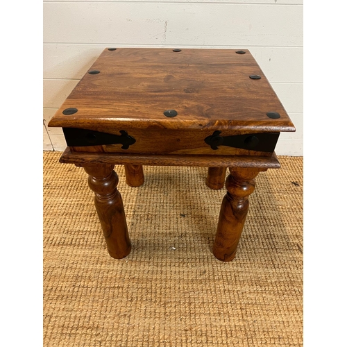 48 - A hardwood side table with metal work studs to top (H50cm Sq45cm)