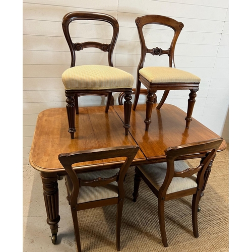 50 - A Regency style mahogany extendable table with six chairs of two different styles (H73cm W144cm D100... 