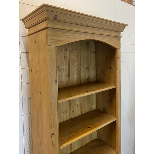 58 - A pine bookcase with five shelves (H198cm W84cm D36cm)