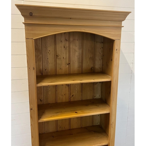 58 - A pine bookcase with five shelves (H198cm W84cm D36cm)