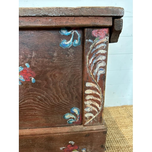 63 - An oak painted trunk with a scrolling fern motif. Height 69 106x45