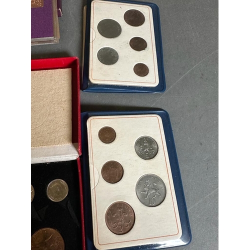 692 - A selection of Royal Mint collectors packs to include: Britain's first Decimal coins, 1970 Coinage o... 