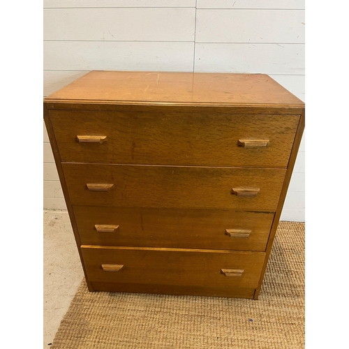 70 - A 1940's untility furniture chest of drawers by Gomme (H87cm W76cm D46cm)