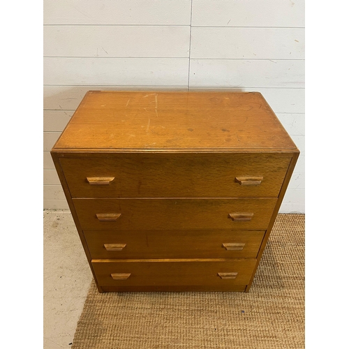 70 - A 1940's untility furniture chest of drawers by Gomme (H87cm W76cm D46cm)