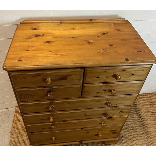 73 - A Ducal chest of drawers, four over four (H117cm W88cm D45cm)