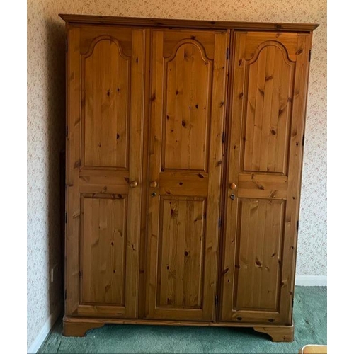 77 - A triple pine Ducal wardrobe