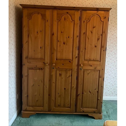 77 - A triple pine Ducal wardrobe