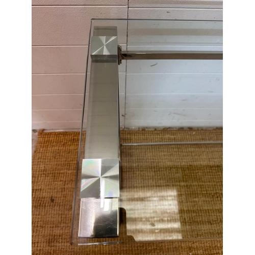 82 - A contemporary chrome based console table with glass top Height 78 40x120